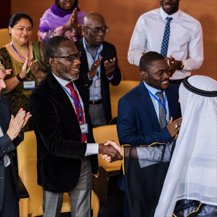 Group of diverse professionals networking at the Afrienextradel conference